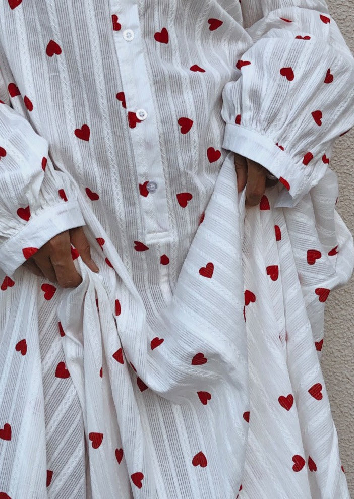 Comfortable and chic white summer maxi dress with subtle heart jacquard