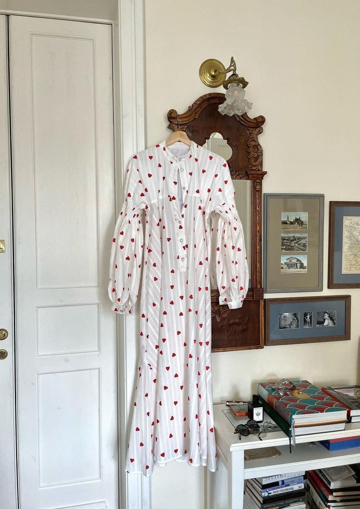 A white embroidered maxi dress, embodying casual summer fashion