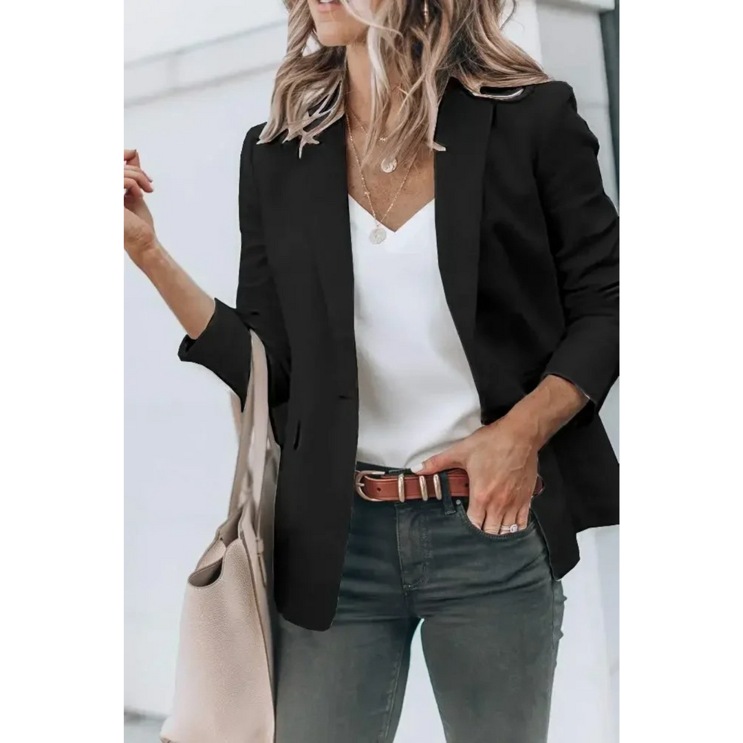 Loose fit women's puff sleeve blazer, a versatile fashion jacket for elegant office or stylish casual wear.