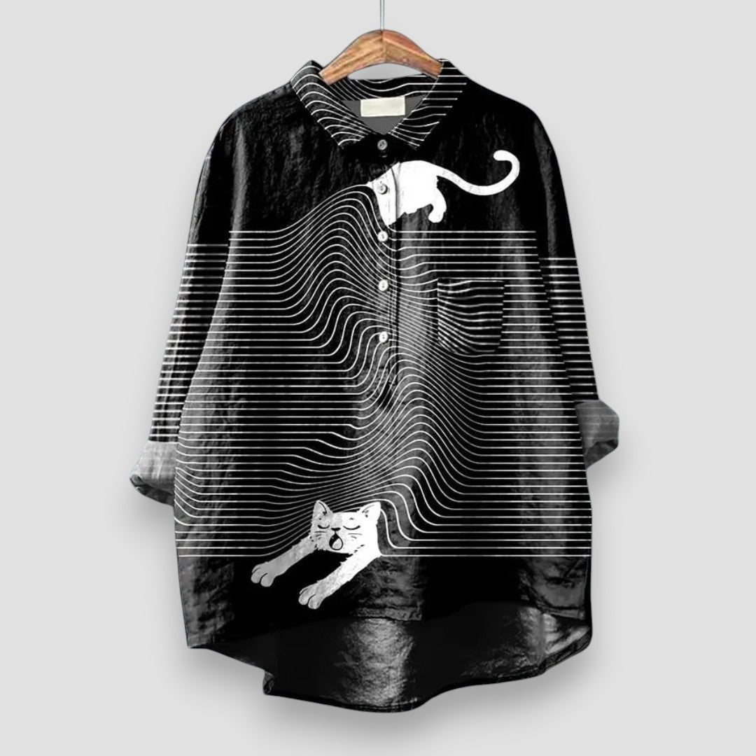 Stylish women's comfortable blouse featuring a playful dog print, a charming animal print fashion top.