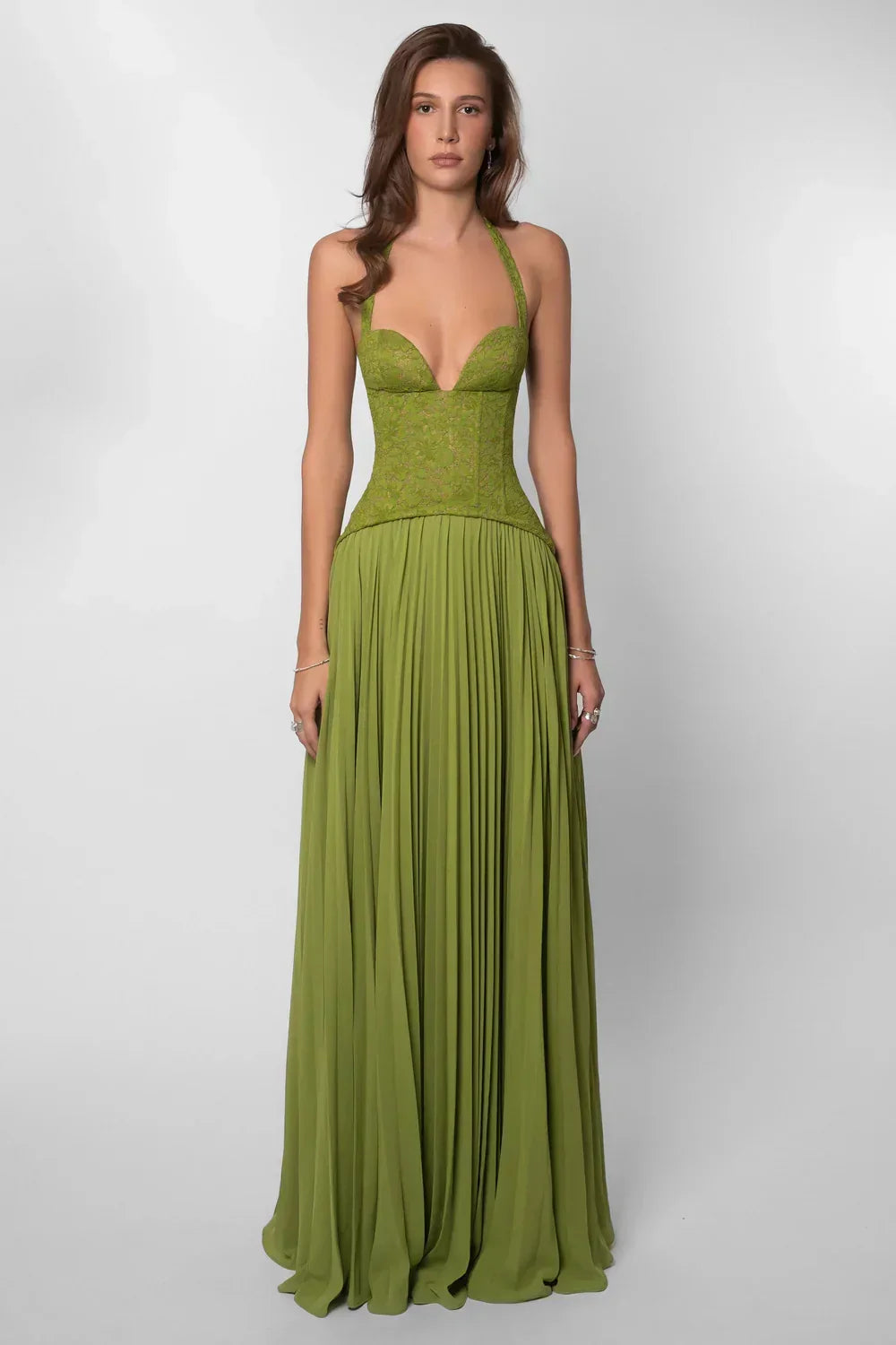 Stylish women's halter neck pleated maxi dress. An elegant choice for wedding guests & special evening occasions.