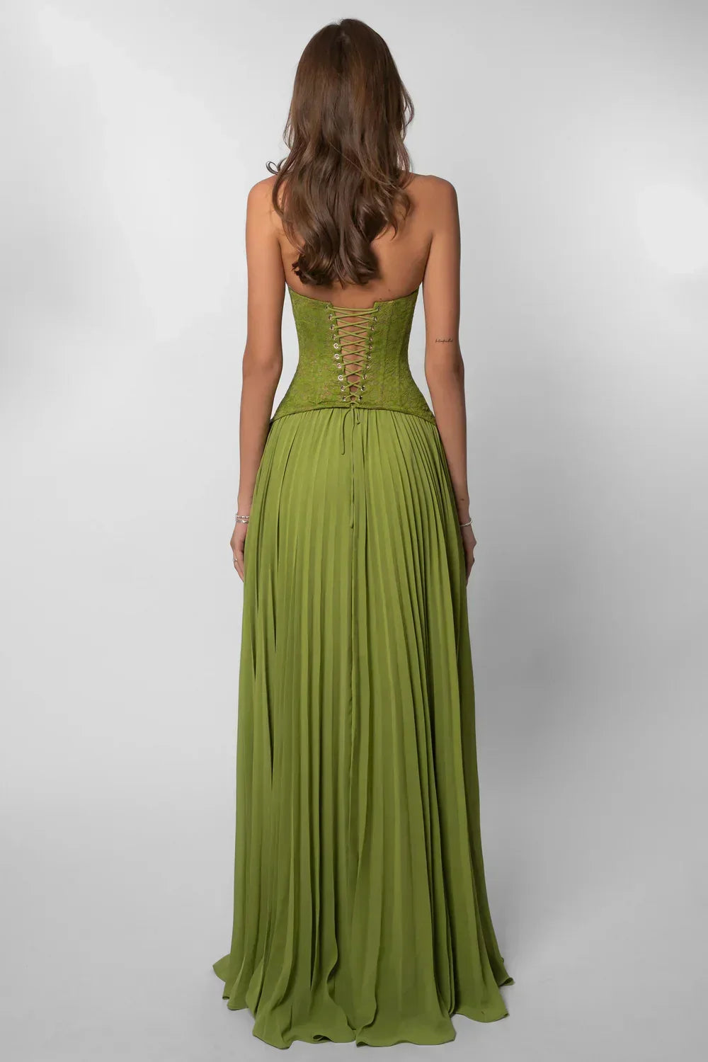 Stunning green halter neck pleated maxi dress for women. Ideal wedding guest dress & formal summer evening wear.