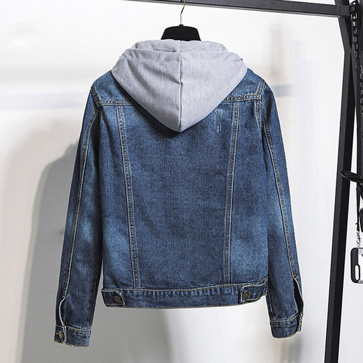Close-up of a chic women's plus size hooded denim jacket. Features functional buttons & comfortable hood details.