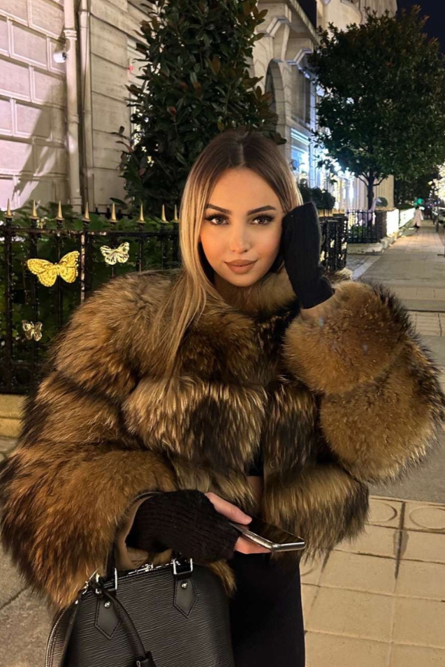 Women's plush faux fur jacket in a luxurious, elegant design for chic winter fashion.