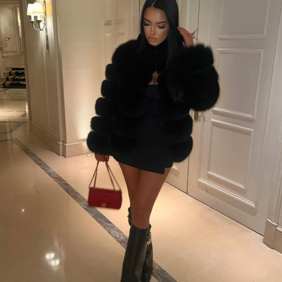 Chic women's faux fur jacket, a must-have plush outerwear for the modern fashionista.