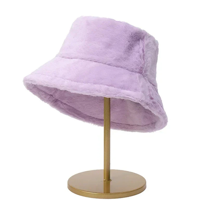 Premium women's plush faux rabbit fur bucket hat, soft and warm for winter adventures.