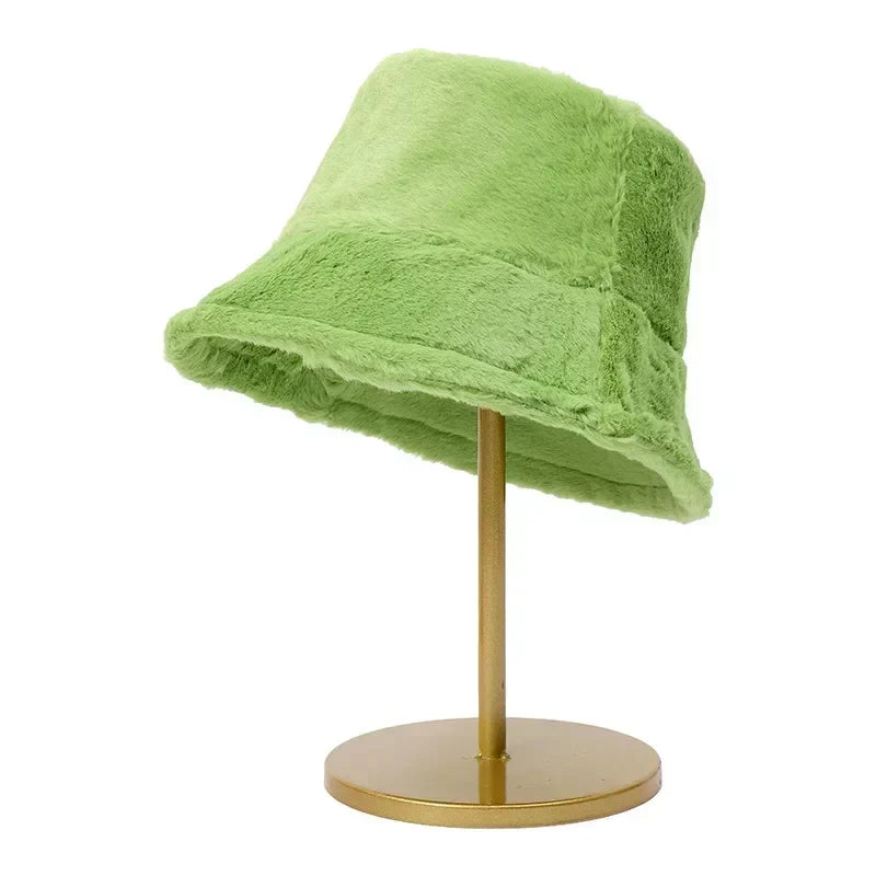 Fashionable women's bucket hat in plush faux rabbit fur, a must-have autumn accessory.