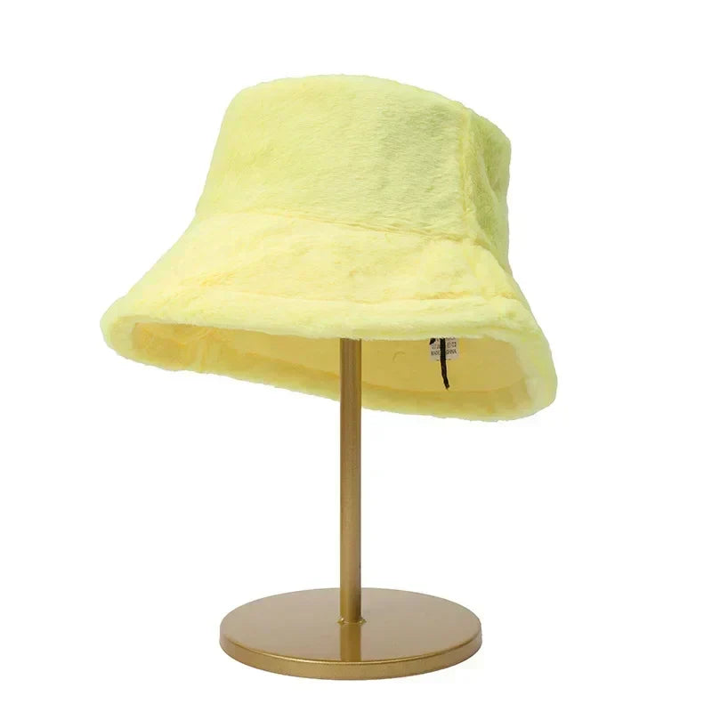 Women's warm bucket hat, featuring a luxurious faux rabbit fur texture for cozy wear.