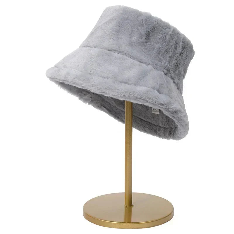 Cozy women's autumn bucket hat, crafted from soft faux rabbit fur for ultimate warmth.