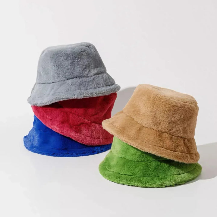 Women's winter fashion accessory: soft faux rabbit fur bucket hat, comfortable & chic.