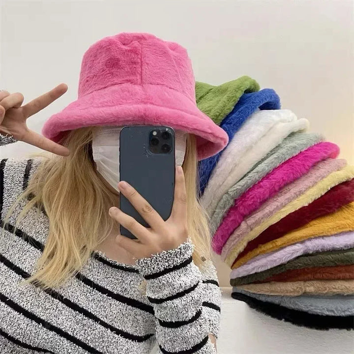 Elegant women's plush bucket hat, made with faux rabbit fur for a luxurious feel & warmth.