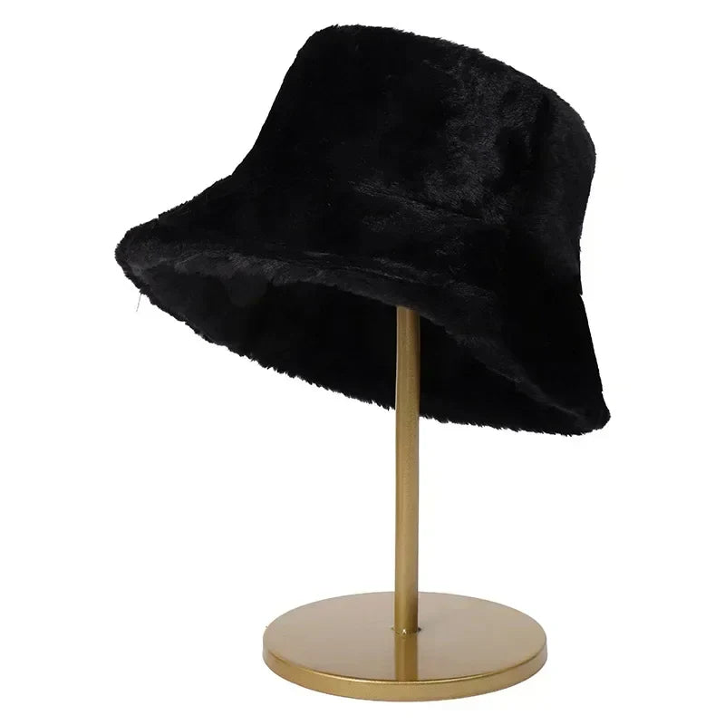 Stylish faux fur bucket hat for women, featuring plush rabbit fur for warmth & comfort.