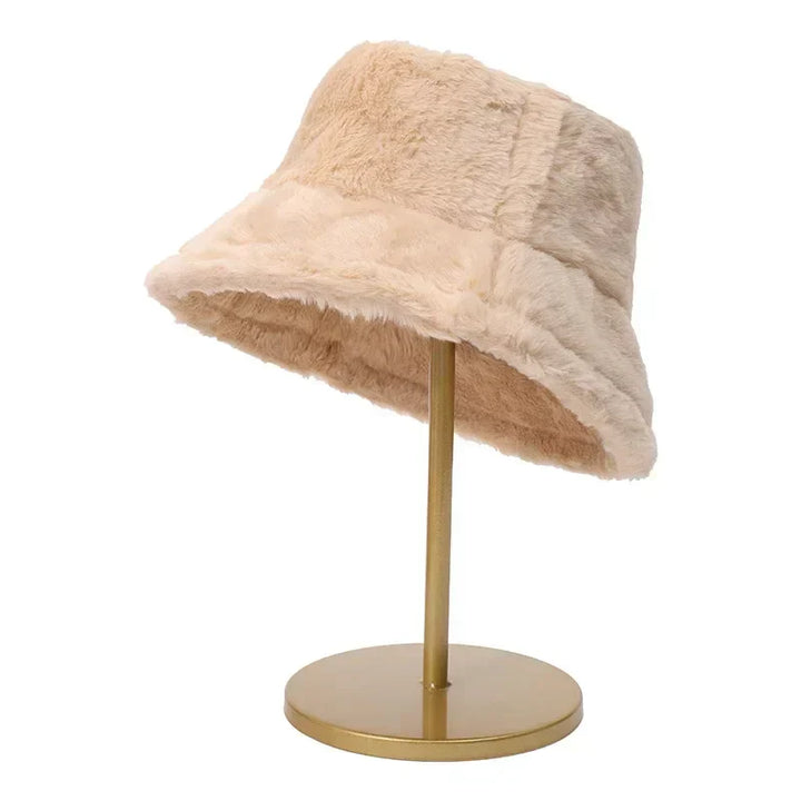 Luxurious women's faux rabbit fur bucket hat, a chic & soft headwear accessory.