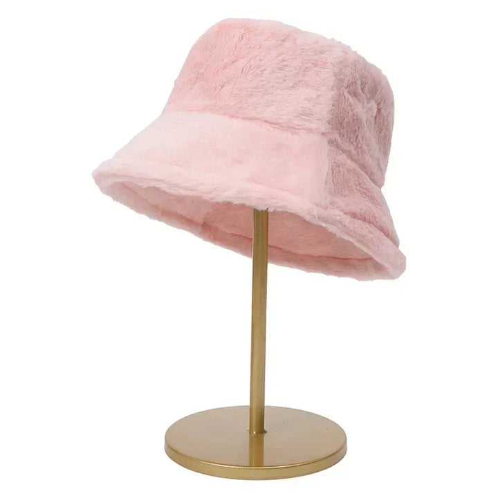 Elegant women's bucket hat with plush faux rabbit fur, designed for warmth & style.