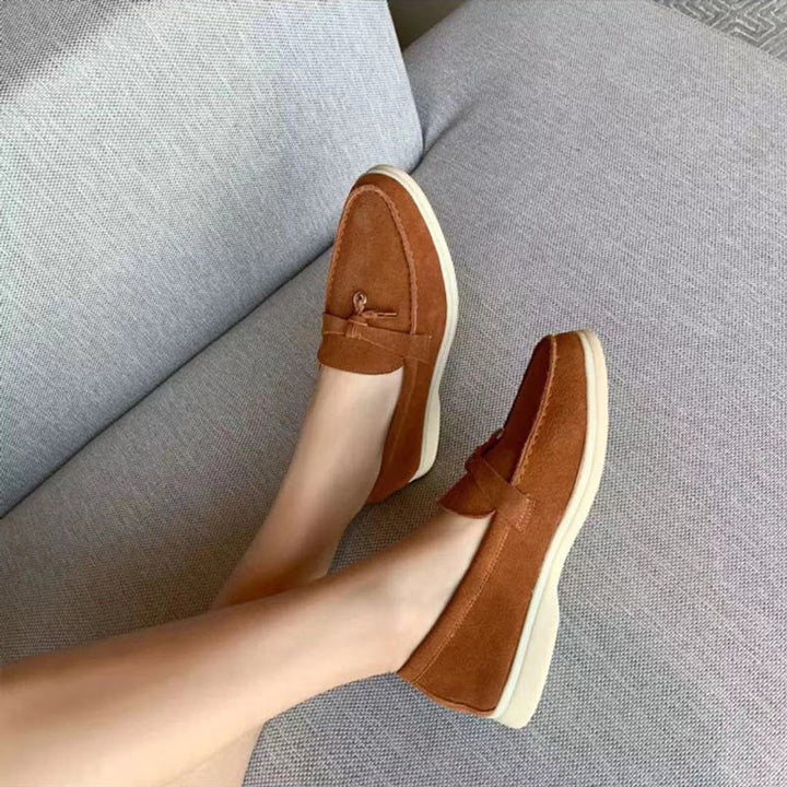 Classic women's pointed-toe slip-on loafers. Stylish & comfortable everyday flats for modern women.