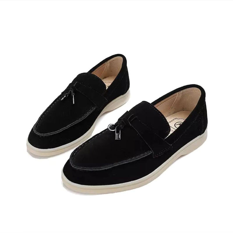 Ultra-comfortable women's pointed-toe loafers. Stylish slip-on flats designed for long days and effortless chic.