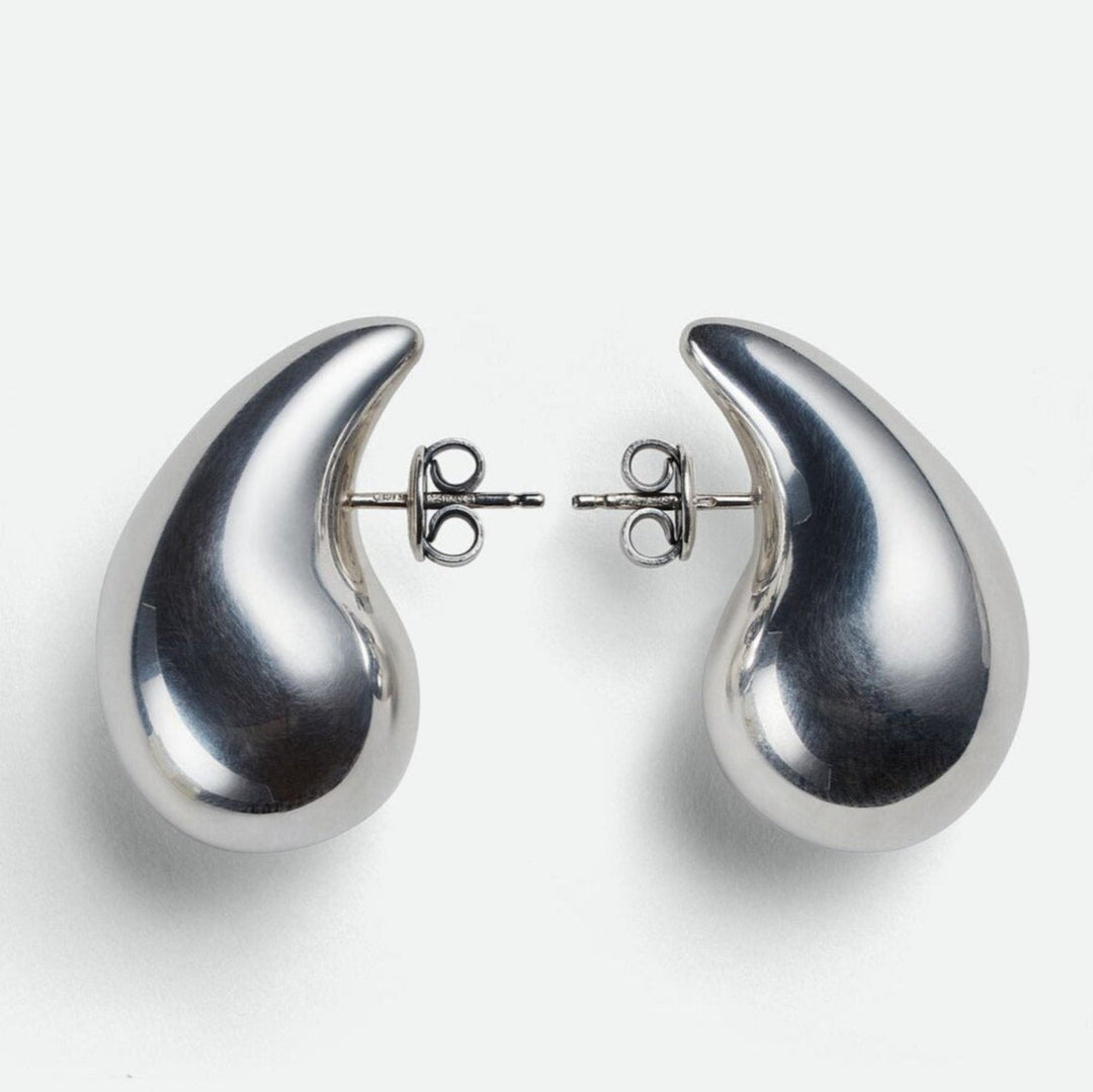 Sleek silver polished teardrop dangle earrings, women's elegant minimalist jewellery.