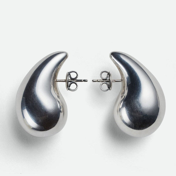 Sleek silver polished teardrop dangle earrings, women's elegant minimalist jewellery.