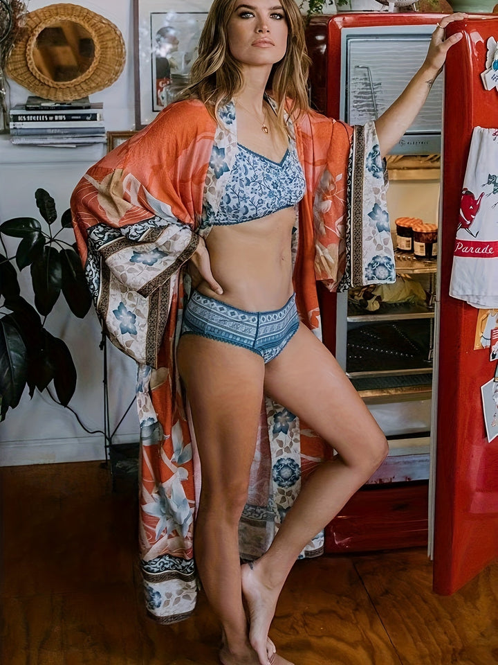 Vacation essential: Red floral batwing sleeve kimono beach cover-up for women's summer fashion.