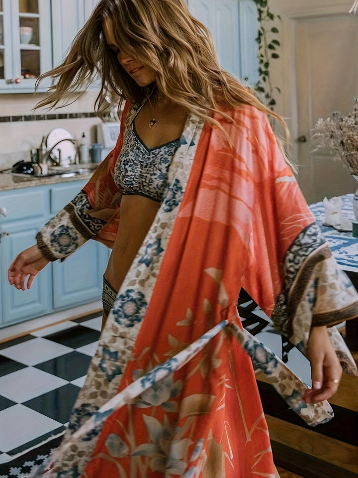 Stylish women's red floral print kimono cover-up, great for beachwear & resort fashion.