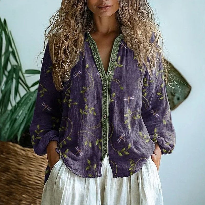 Women's relaxed fit blouse with elegant nature print, perfect for casual or dressy occasions.