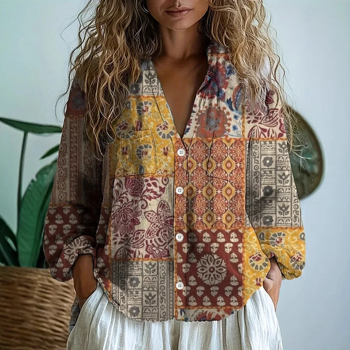 Casual wear women's top: relaxed fit blouse with a unique botanical print.