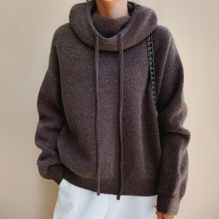 Cozy women's relaxed cowl neck hoodie. Effortless comfort, ideal for layering or everyday style. Soft long sleeve top.