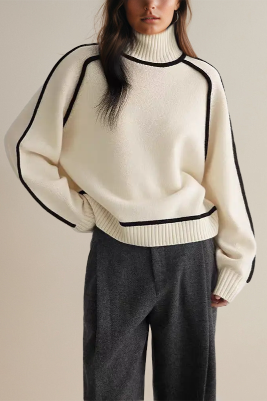 Stylish women's chunky knit turtleneck sweater. Relaxed fit, perfect for cozy winter layering.