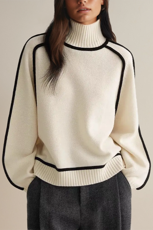 Comfortable women's relaxed knit turtleneck sweater with long sleeves, ideal for chic winter fashion.