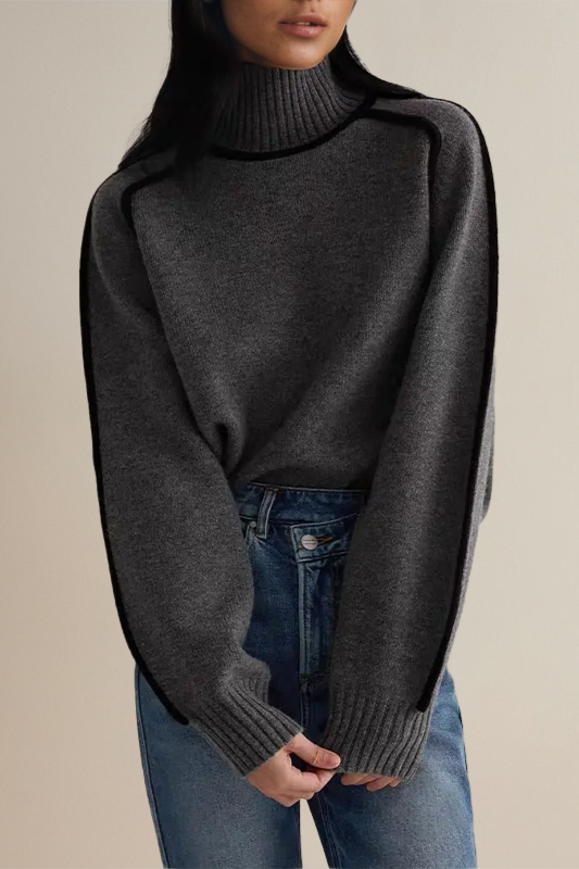 Chic women's long sleeve relaxed fit turtleneck sweater. Soft knitwear, perfect for autumn and winter layering.