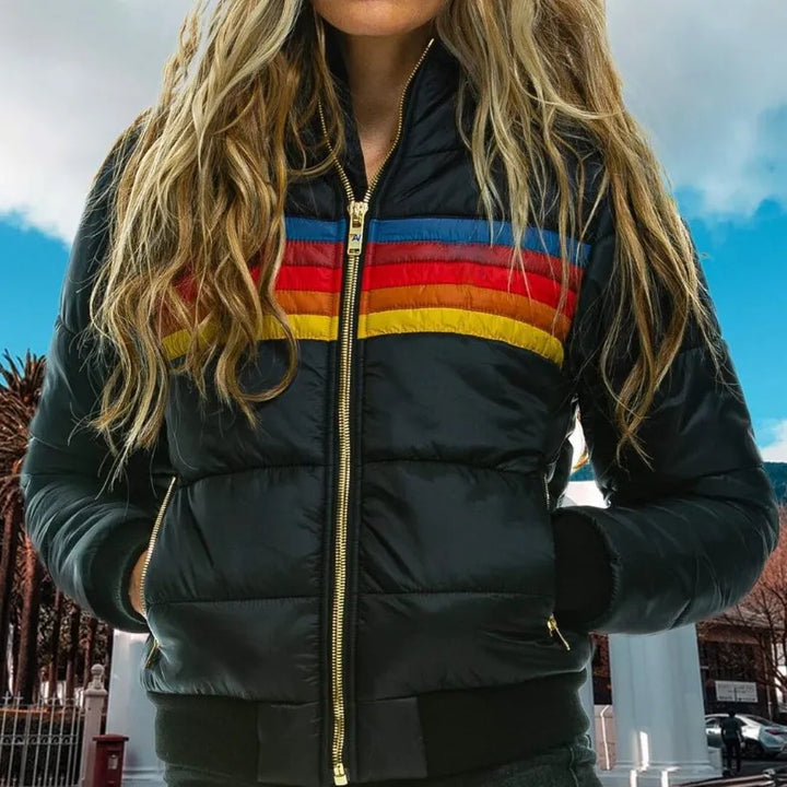 Retro striped women's puffer jacket, hooded and warm. A colorful, casual winter fashion essential.