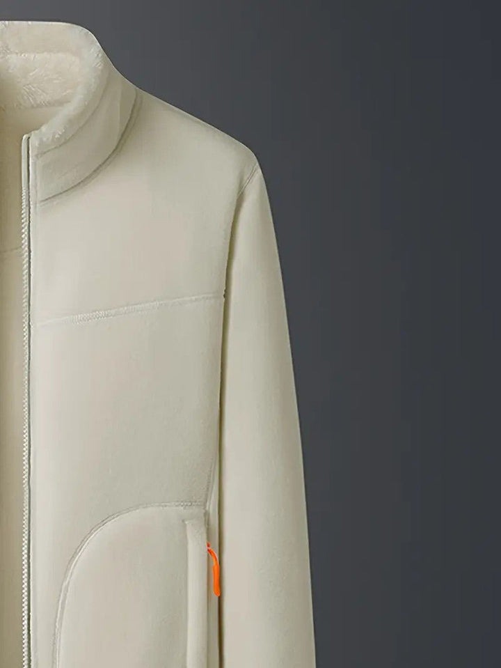 Women's warm, zip-up reversible jacket. An essential, fashionable outerwear piece for cold winters.