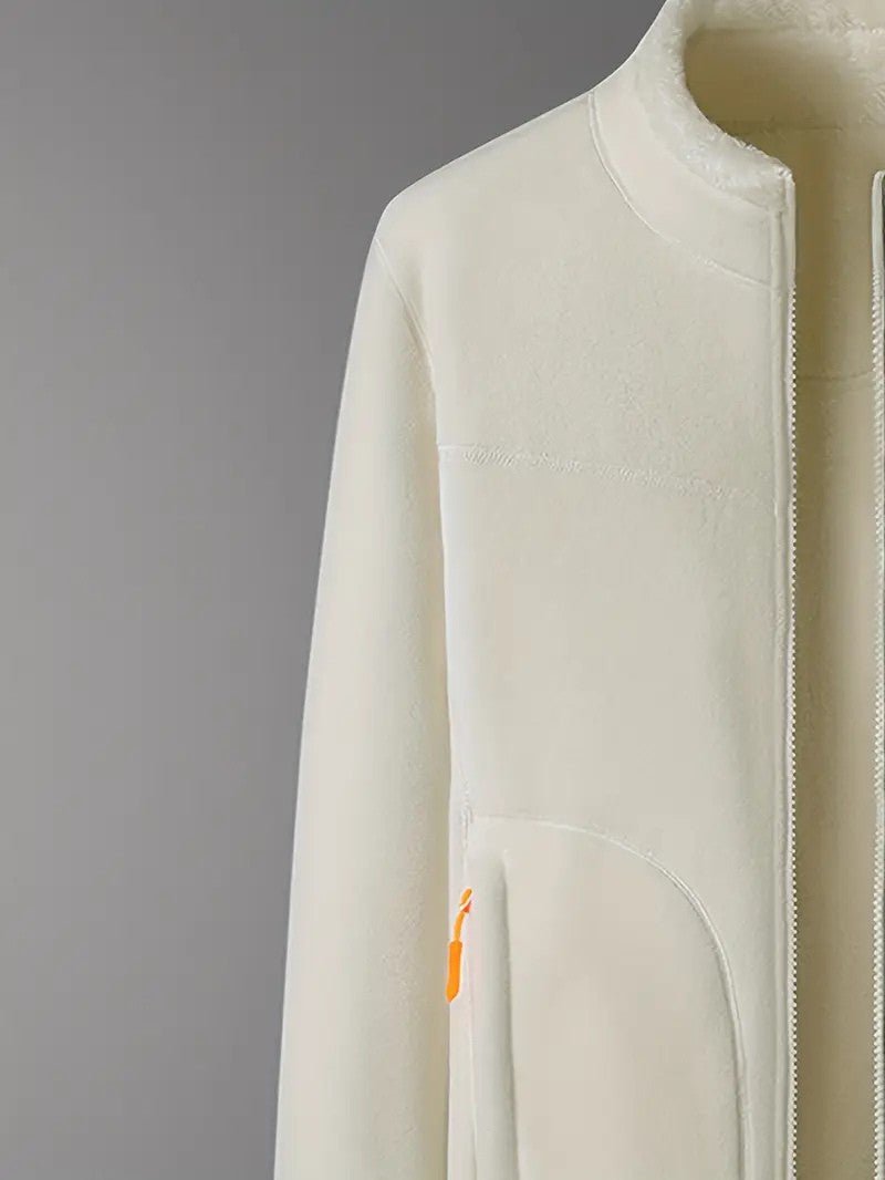 Versatile women's reversible jacket in pink and ivory, a cozy and stylish choice for winter fashion.