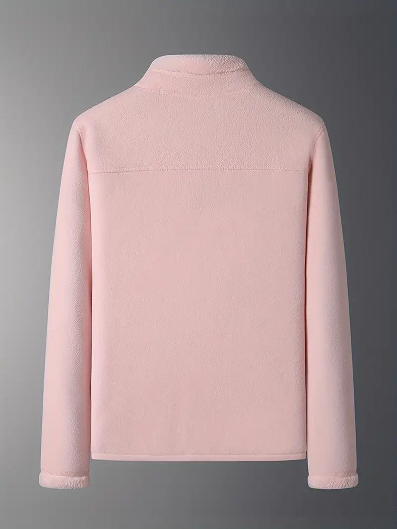 Pink and ivory reversible women's jacket. A versatile, warm essential for chilly winter days.