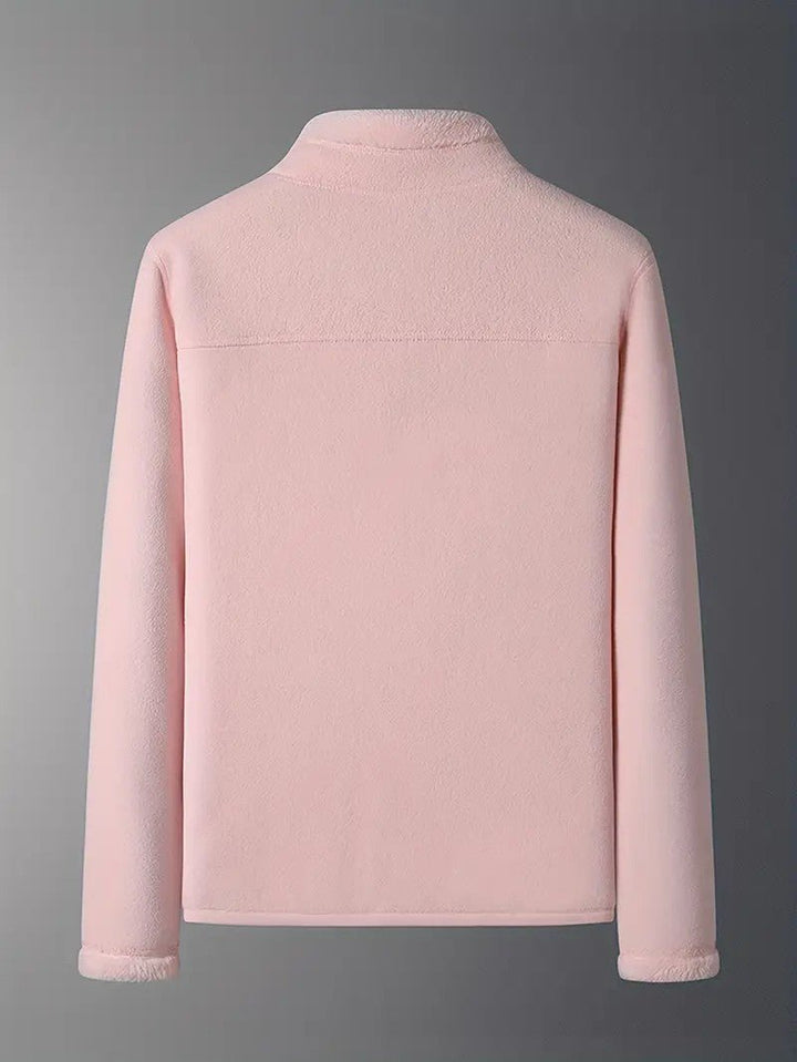 Pink and ivory reversible women's jacket. A versatile, warm essential for chilly winter days.