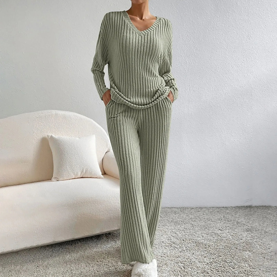 Women's ribbed knit lounge set, featuring relaxed fit top & bottoms. Chic two-piece for ultimate comfort.