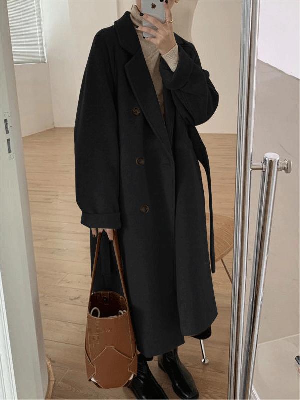 Versatile women's belted coat, a classic winter outerwear staple for elegant and cozy style.