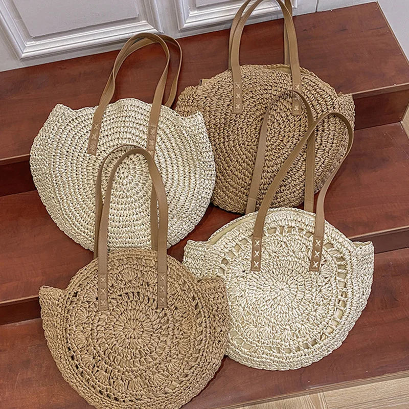 Women's large round woven beach tote bag, essential for summer, vacation, and shoulder carrying.