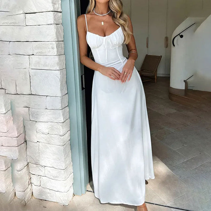 Elegant sleeveless ruched bodice maxi dress, perfect for formal evening events.