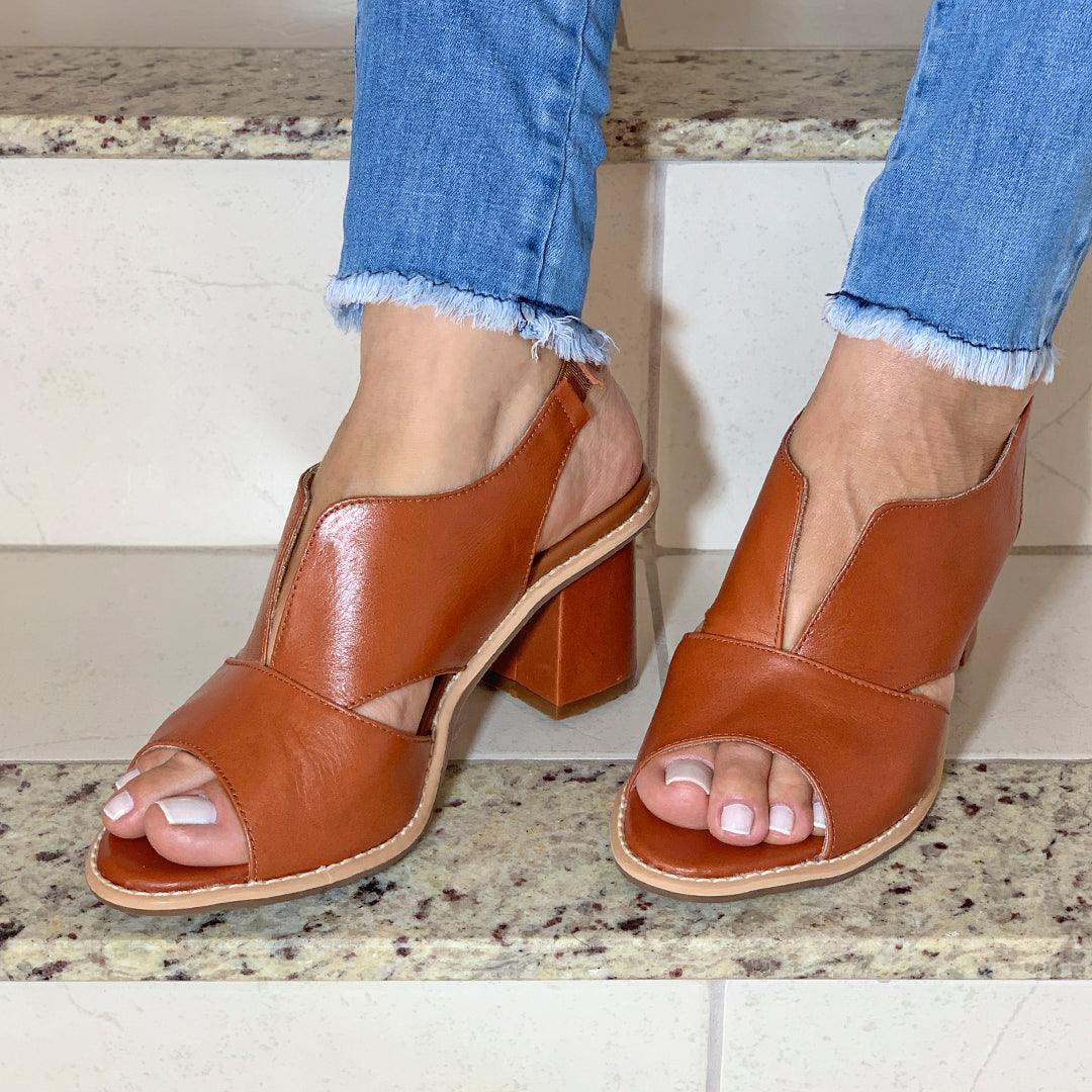 Elegant Selina women's leather heeled sandals, featuring a comfort footbed for all-day wear.