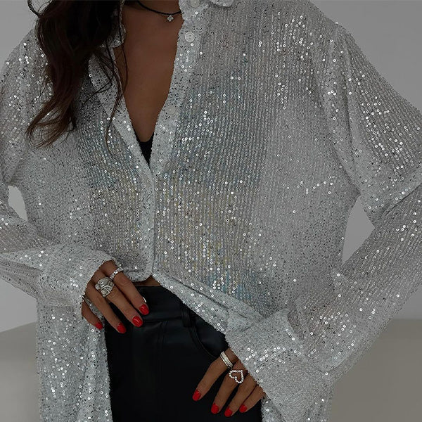 Women's sequin party blouse, a sparkling top for glamorous evening wear and special occasions.