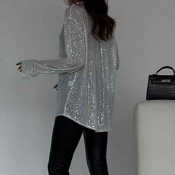 Fashionable women's sequin blouse, a sparkling and glamorous party top for women.