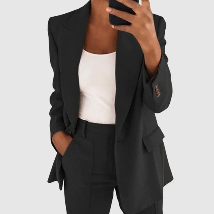 Elegant women's blazer & trousers set. Formal two-piece outfit, perfect for business attire, office wear, or special events.