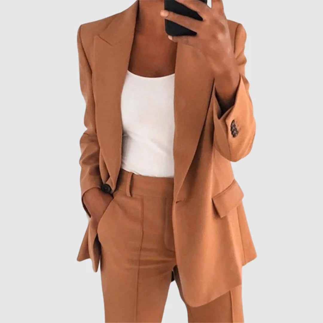 Chic women's tailored blazer and trousers set. This elegant outfit suits professional business attire & stylish occasions.