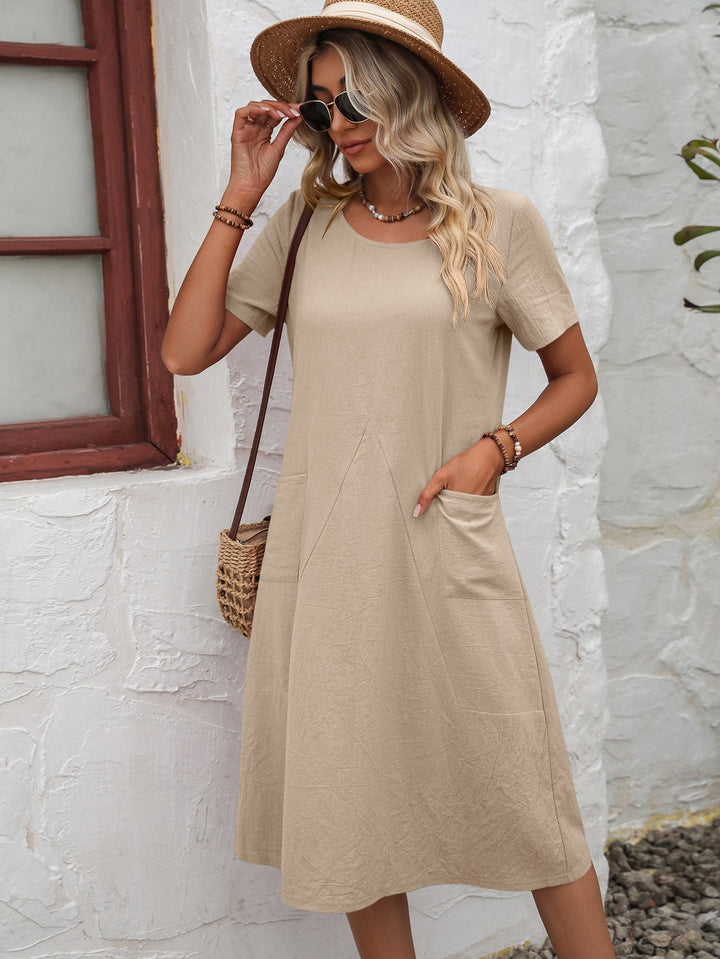 Summer essential: women's casual short sleeve A-line dress with convenient pockets.