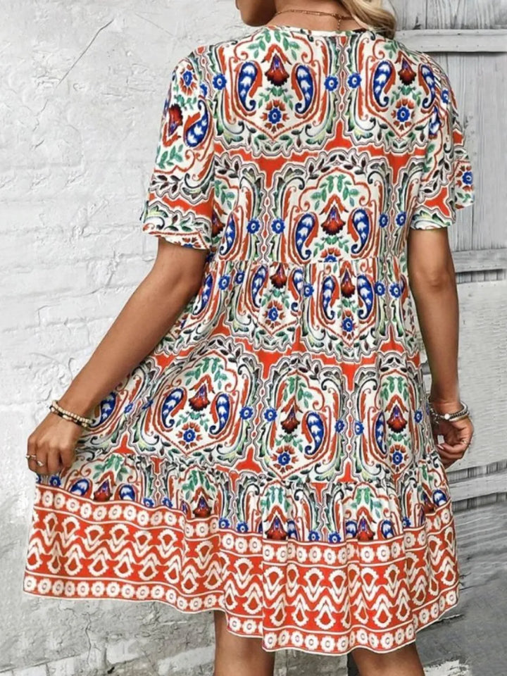 Short sleeve summer dress, featuring a flattering mini length