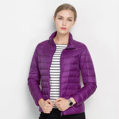 Fashionable women's autumn/winter slim fit quilted puffer jacket. Warm outerwear with stand collar.
