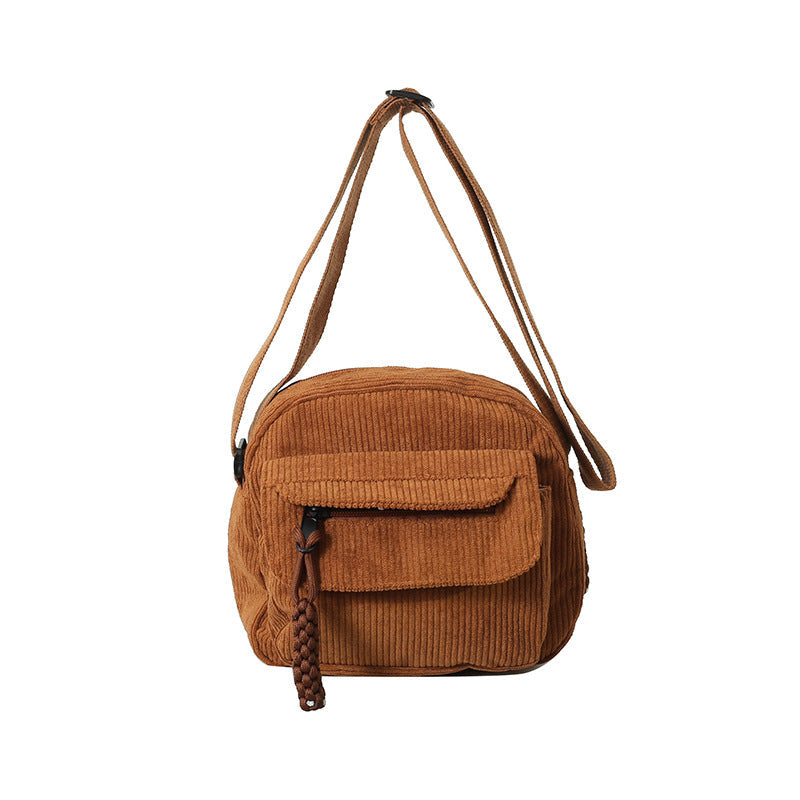 Textured women's crossbody bag, a chic and versatile fashion accessory.