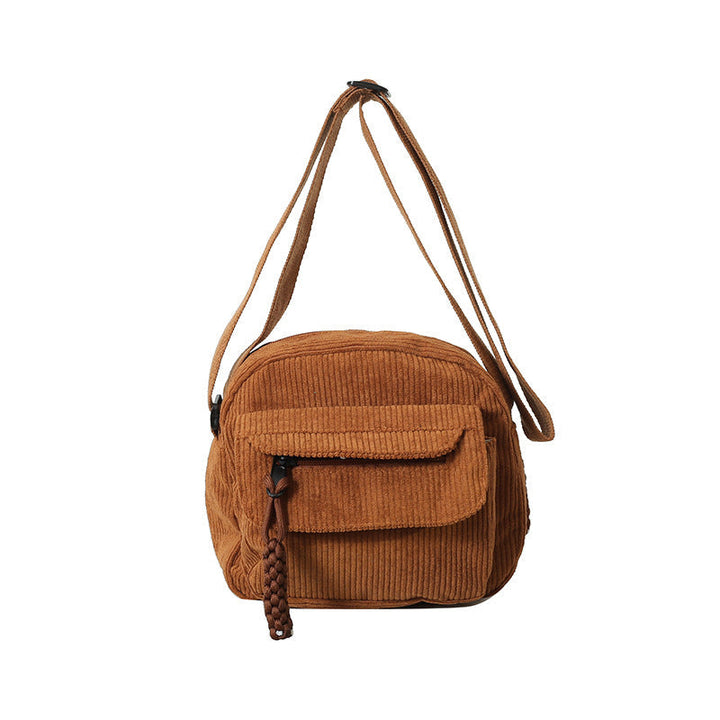 Textured women's crossbody bag, a chic and versatile fashion accessory.