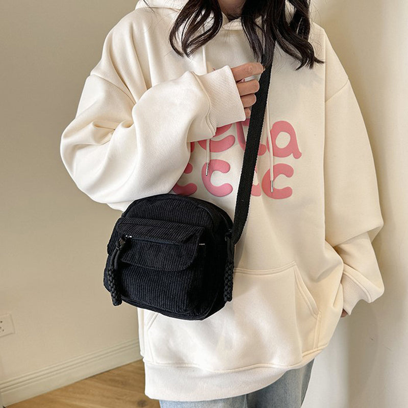 Textured small crossbody bag, a perfect everyday accessory for women.